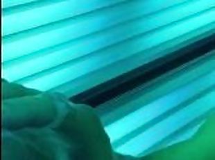 hot guy blows his giant load all over tanning booth! best cumshot ever