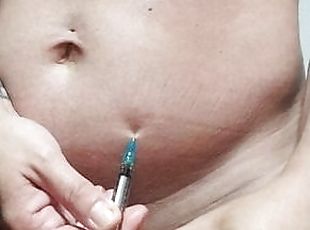 Ftm takes injection in cubby tummy