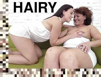 Hairy granny orally pleased by lesbian babe