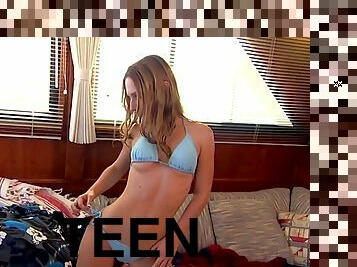 Randy brunette teen masturbating in a yacht