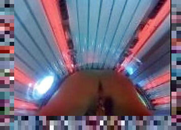 Thick milf takes her bbc dildo to the tanning salon & squirts all over the sunbed