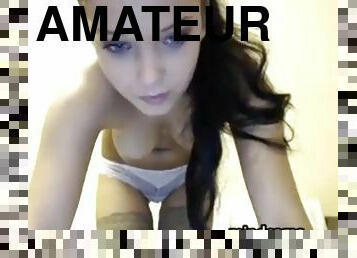 Stunning teen teasing her tits on cam