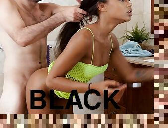 A cute black teen enjoys rough interracial sex in the shower.