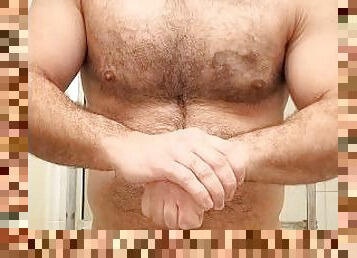 HAIRY MUSCLE BEAR FLEXING BEFORE HOT SHOWER!