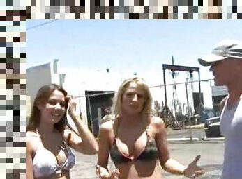 Hot bikini girls wash his car outdoors