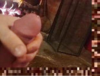 Wanking by the fire place