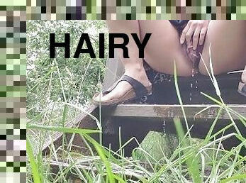 Hairy pussy pissing on the back porch steps