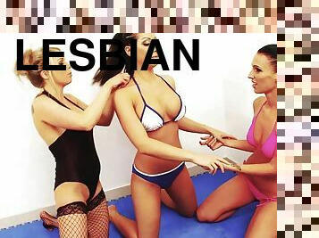 Three hot girls have a wild lesbian chocolate syrup wrestling match
