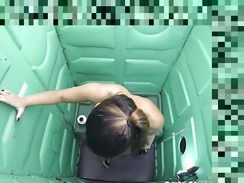 Asian swallows loads of cum in public porta potty gloryhole