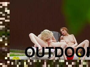 Rebecca Nikson, Milka Wey, and Lana Rose pleasuring each other outdoors