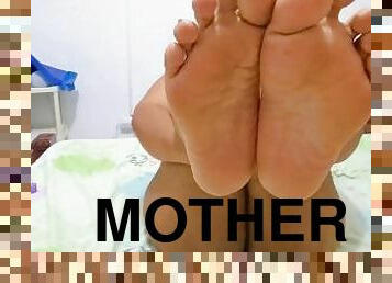 Sexy horny mother wants to seduce you by showing the soles of her feet