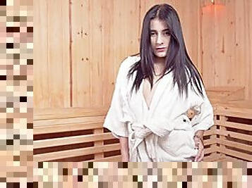 Good looking brunette babe masturbates in the sauna