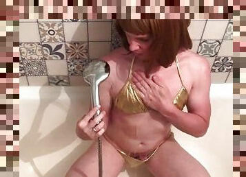 Tgirl washes in the shower