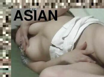 Asian babe masturbates