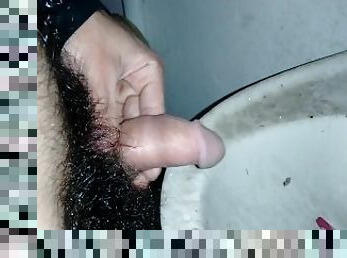 releasing my piss/ around the toilet