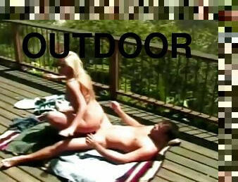 Lovely blonde enjoys fucking outdoors under the hot sun