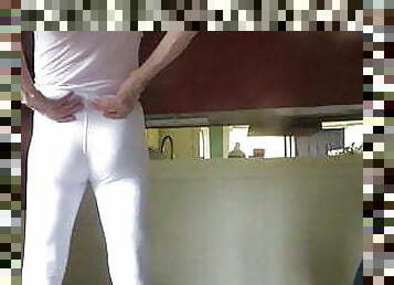 Male slut in skin-tight white spandex leggings.