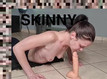 skinny slut doing pushups while gagging on a dildo topless