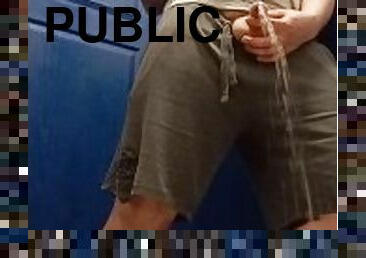Posing and pissing in the gym loo