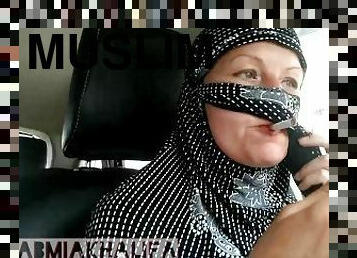 Muslim girl in hijab Smoking first time in car