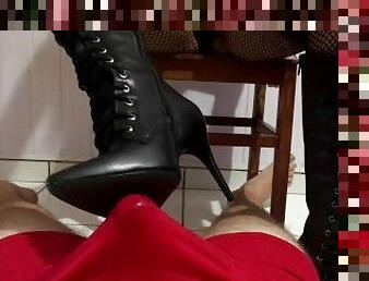 Black leather boots and fishnets stockings footjob cum in pants