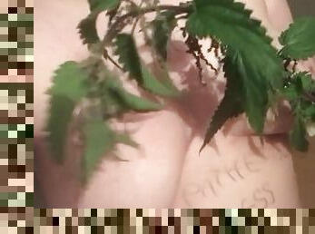 Stupid slut whips herself with nettles