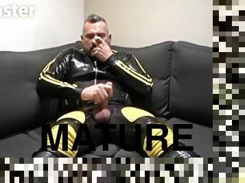DILF jerks uncut cock in rubber and sniffs PREVIEW