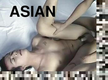 Brunette Asian guy fists and fucks his friend ass in spreadeagle position on the bed