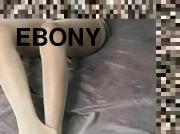 Ebony in shiny Nylons and so sexy wrinkled soles
