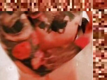 Sexy tattooed guy washing, masturbating and moaning in shower