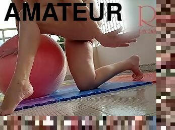 Nice cute Lady doing yoga on her yard. Naked gymnast fitness ball at the roof. Naked yoga.
