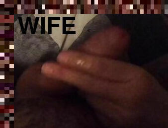 Close up POV handjob from wife in bed while she plays on her smartphone
