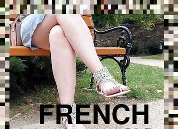 French pedicured feet at last summer day in park