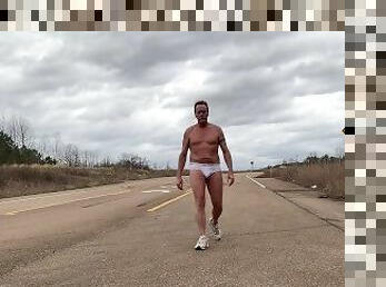 Walking along the road in underwear .... it's not illegal