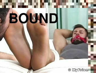 Bound bearded hunk mouth folded and toe sucked sensually