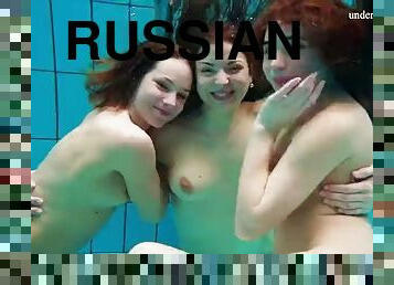 Avenna with Nina Mokhnatka and Marketa swim in the pool