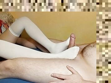 Footjob with Handjob in White Stockings Causes Huge Cumshot