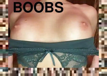 The girl shows her beautiful boobs and plays with them
