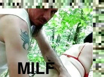 Sexy MILF rough fisted in the forest again!