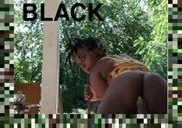 BLACK GIRL MASTURBATING OUTSIDE RIDING BIG DILDO