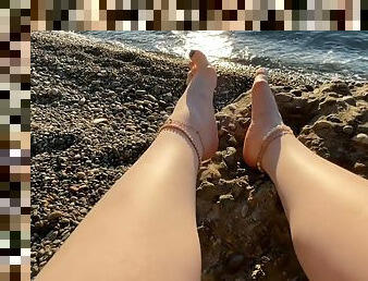 Mistress Lara Plays With Her Feet And Toes On The Beach