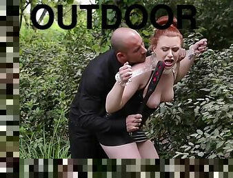 Red Head In Bondage Neck Collar And Hand Cuffs For This Outdoor Fuck