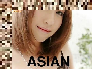 Cute Asian lady shows off her beautiful naked body