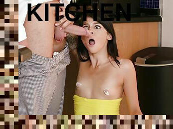 The cook fucks in the kitchen a young brunette with small tits