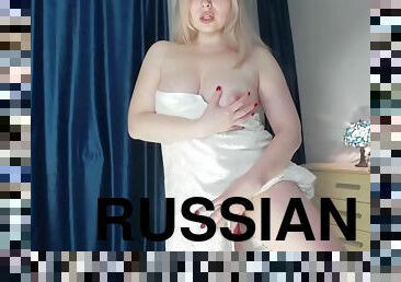 Russian girl with a spicy figure shows herself naked