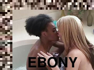 Ebony lesbian and her blonde girlfriend fuck in the bathtub