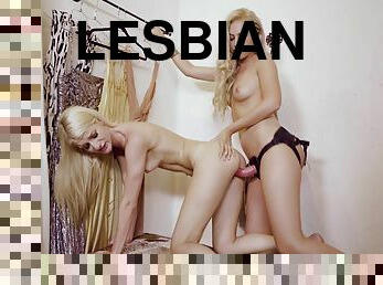 Young Blonde Lesbians Have A Strap-On Sex In Mall's Dressing Room