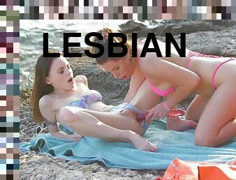 Sexy girlfriends Ally Breelsen and Victoria Traveler are having lesbian sex by the ocean