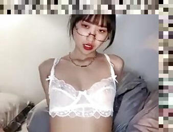 Busty Japanese babe in lingerie gets her pussy licked