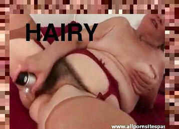 Hairy fat granny fucks cunt with her pussy